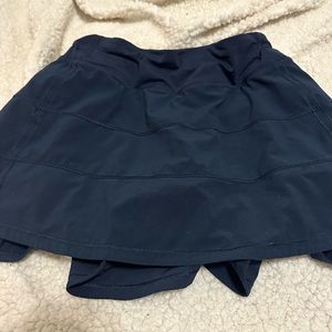 Size 4 tall lululemon pace rival skirt. In the color true navy.